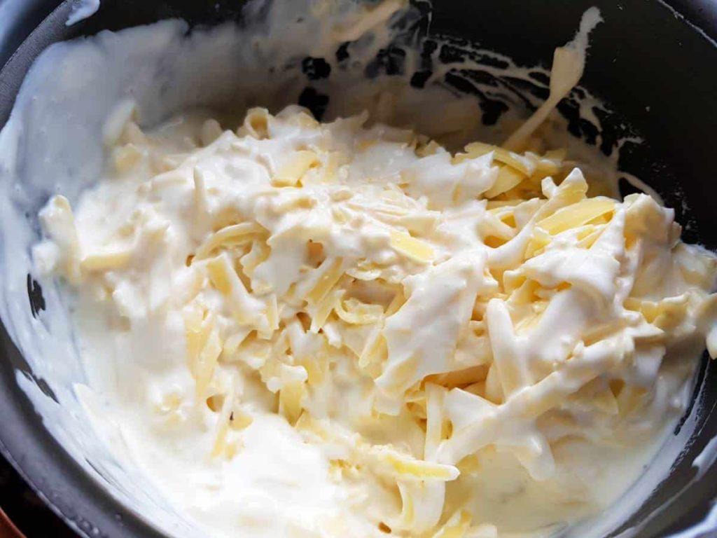 cheese melting in a pot
